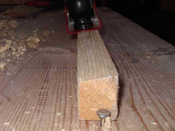 We make a slope on one of the edges of the bar