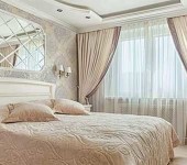Classic curtains in a matching bedroom interior