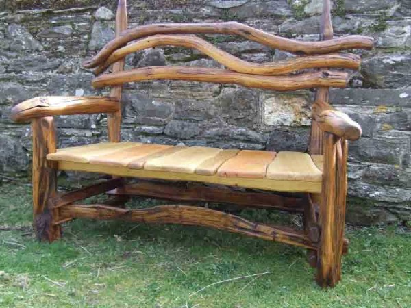 Option of a bench made of wood for a garden or a summer cottage