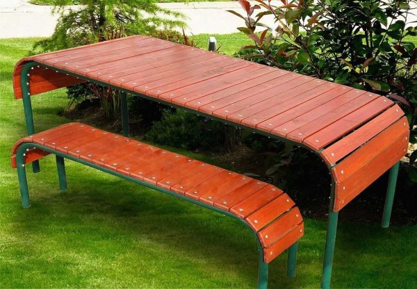 Table and bench made of pipe and boards