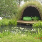 Unusual gazebo - lawn grass is planted along the frame