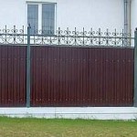Pillars made of a round metal pipe, strips are welded to them from the back side, to which the sheet is attached