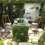 Mossy stones are one of the latest trends in garden design