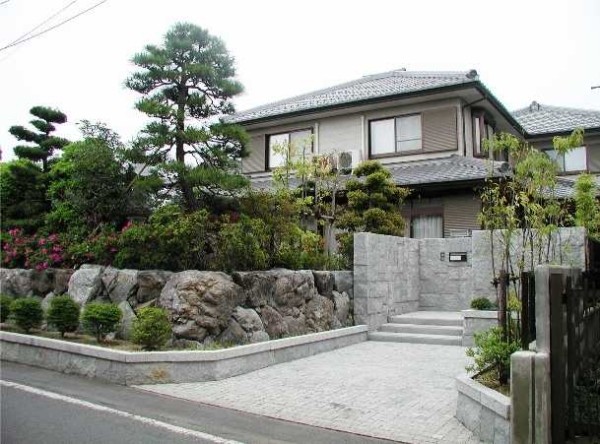 Japanese-style decoration - an abundance of stones and interesting conifers