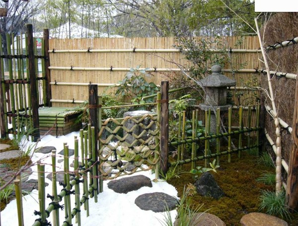 Bamboo is traditionally used. A small fence is extremely easy to do. Bamboo is also good because it does not rot