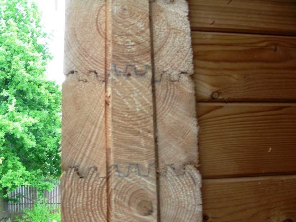 Laminate backing is laid between the timber