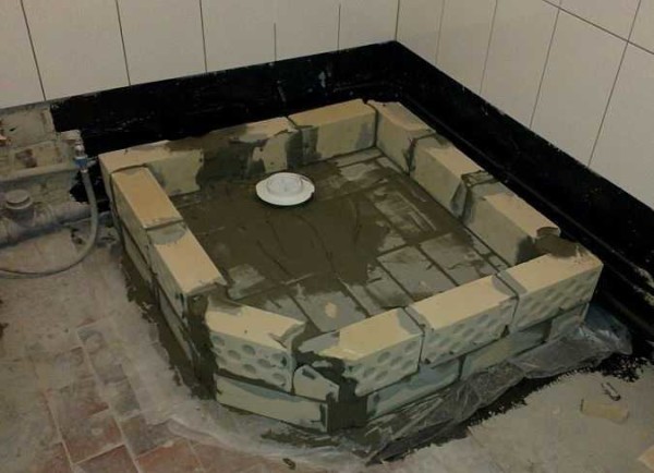 Half finished brick shower tray