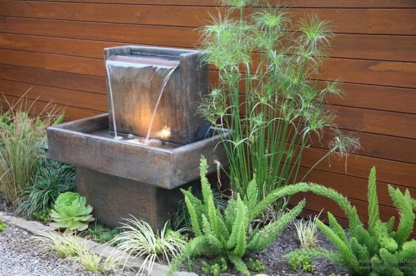 Beautiful fountain for a summer residence in the style of minimalism or modern