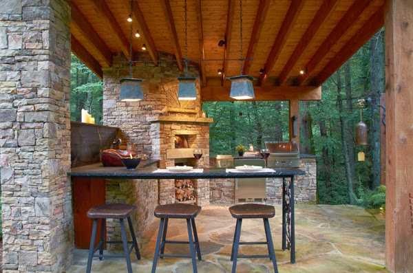 Carrying out to the side of the house - an open terrace with an oven and barbecue