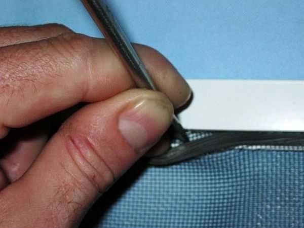 You can pry off the sealing cord with a screwdriver