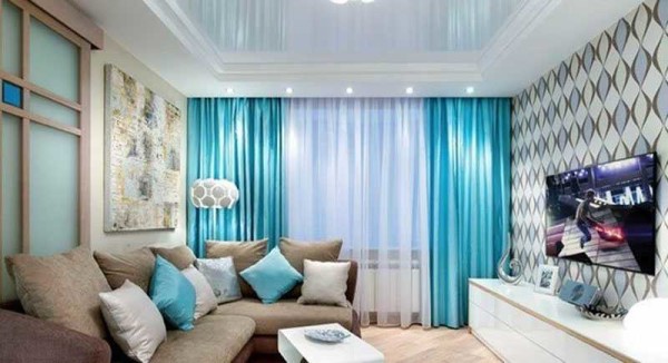 Bright fabric brings the accent to the window