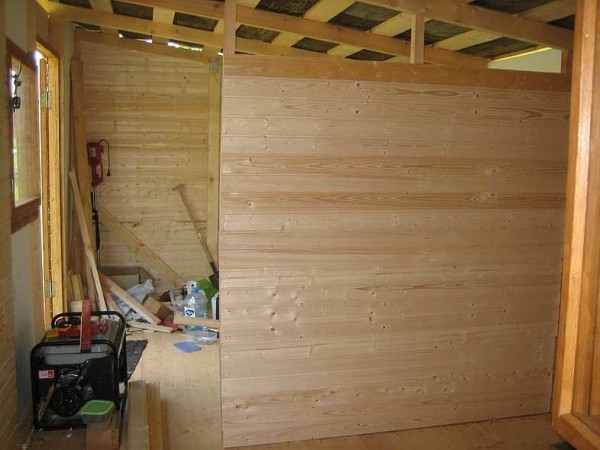 Sheathed on one side with clapboard