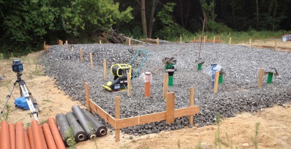 Crushed stone was filled up, embedded elements of the sewerage and water supply were installed