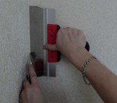 Cut the wallpaper in the corner