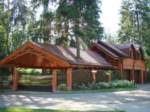 Attaching a canopy to the house makes sense to make the roof look like