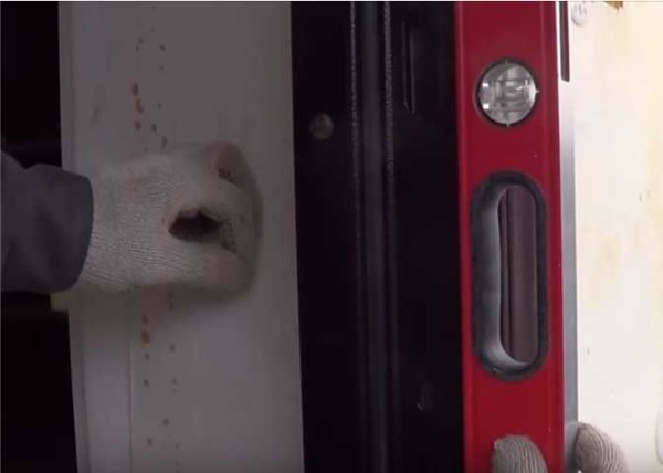 Check if the door frame is aligned vertically