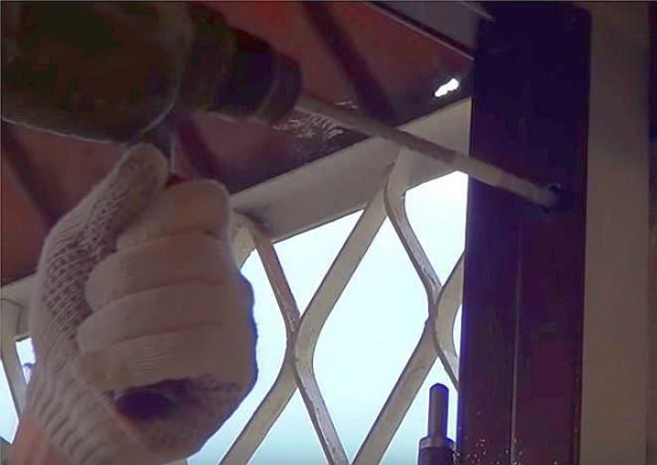 We drill holes from above, from the hinge side