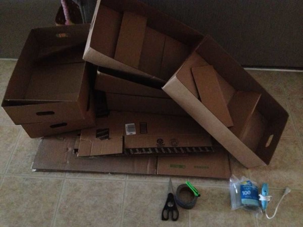 Cardboard from packaging, hot melt glue, a gun for it, tape measure, scissors, a sharp wallpaper knife - all the tools that are necessary for construction