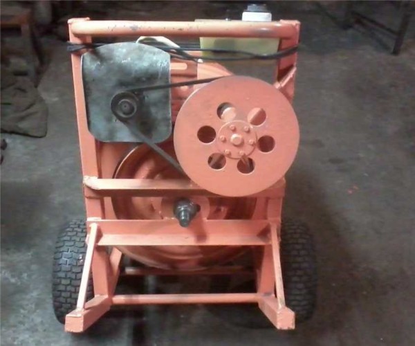 Back view. Under the sheet of metal the motor