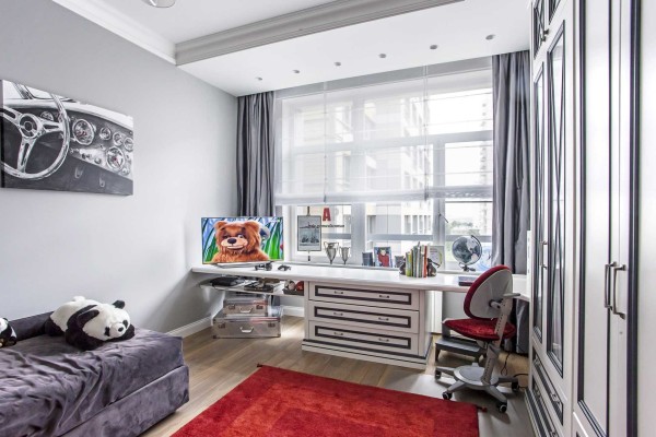 Children's boy room design in gray with burgundy accents