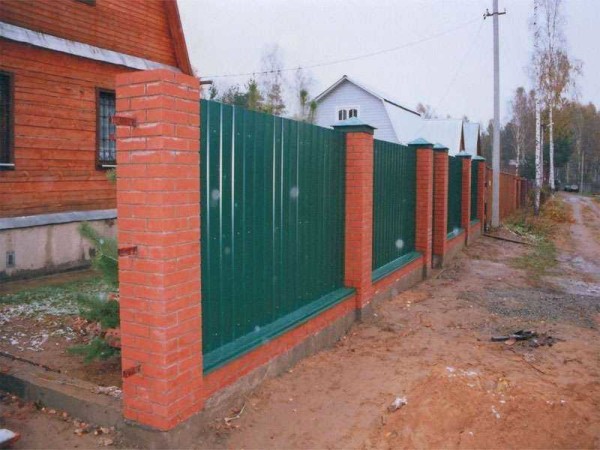 The most popular option is a corrugated fence with brick posts