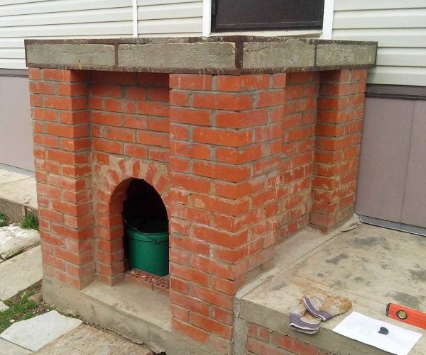 Finished brick base with concrete slab
