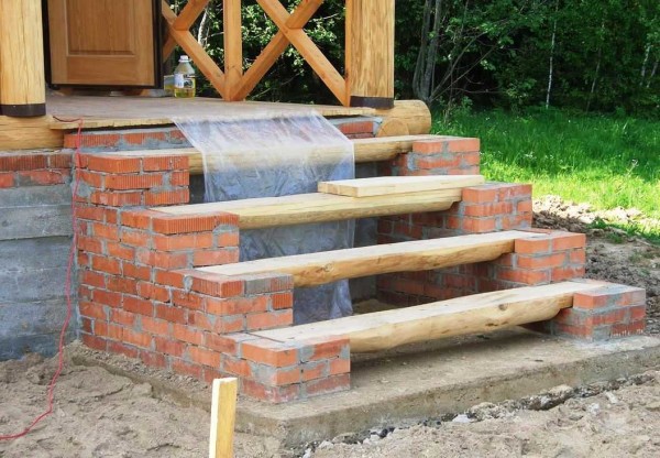 Brick porch with wooden soup