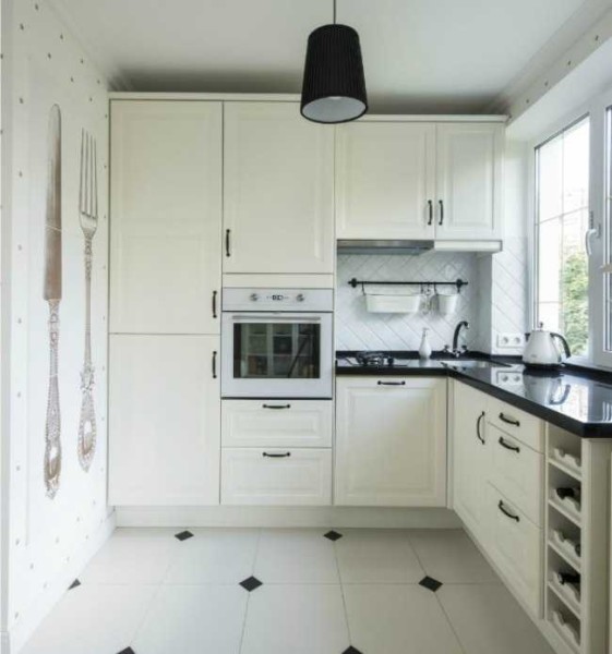 White kitchen with small black accents is always relevant