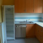 Cabinets are made under the window