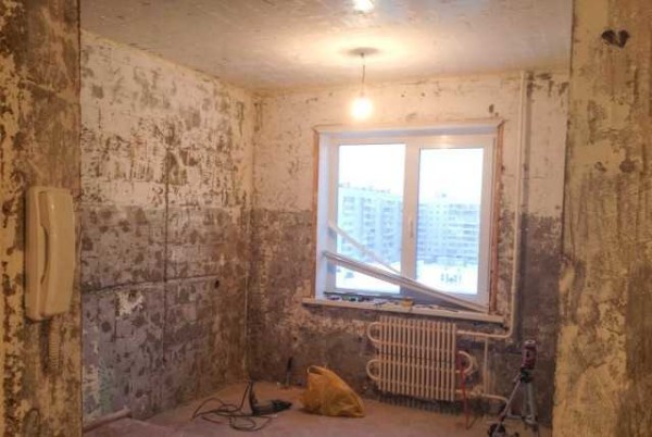 First, grooves are made in the walls for new electrical wiring