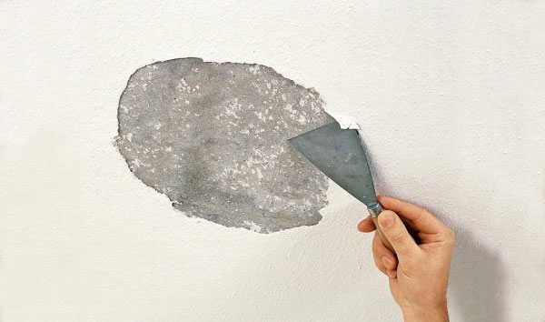 Removing old paint is a lengthy process