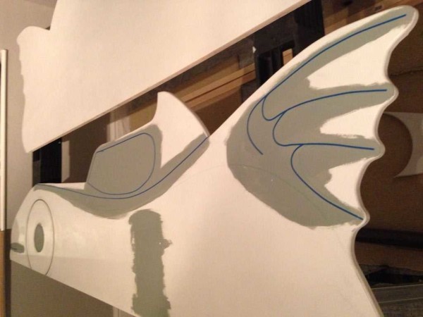 First, paint over with gray, after drying, we glue a thin strip of tape on it