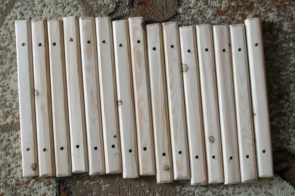 We drill holes in the slats