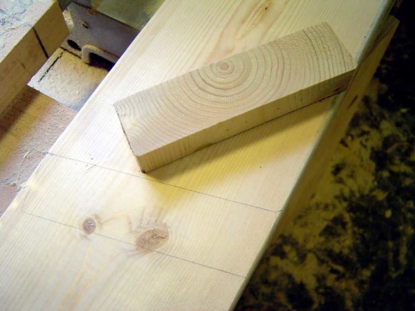 Using a small bar, mark where the steps will be attached