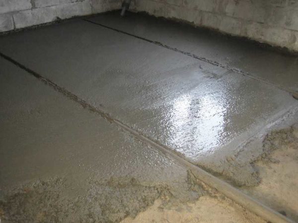 So they pour the concrete floor in the garage along the lighthouses