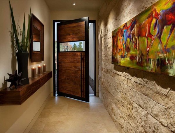 One of the walls in the corridor is decorated with decorative bricks