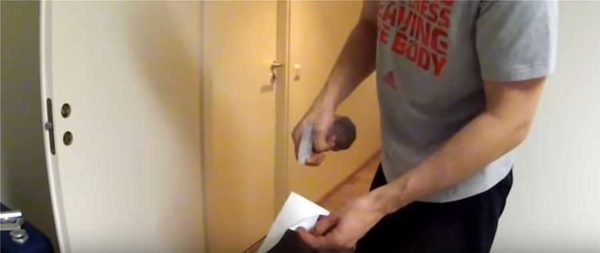 Separate the paper backing on the upper corner, moisten the film with water
