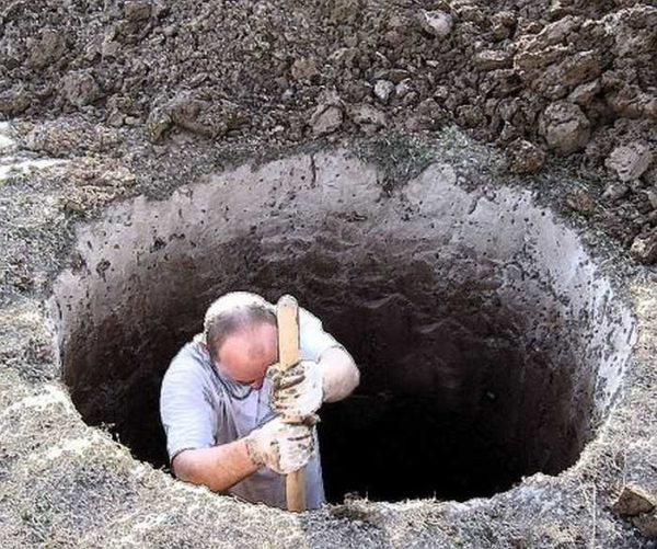 Digging a hole under a well