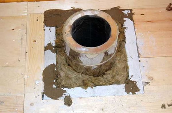 Gray material around the perimeter of the hole - minerite
