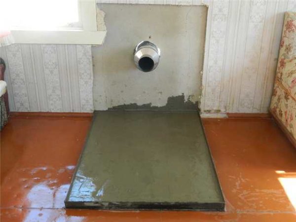 Preparation of the site for the installation of the furnace and the PPU installed in the wall with a piece of pipe