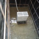 Concrete, caisson crushed by a load