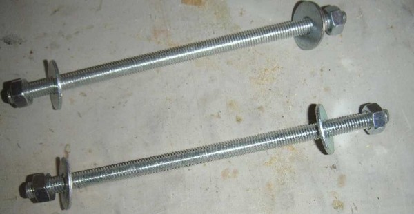 We connect parts of the table with studs with washers and nuts