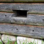 An example of the formation of a vent in a wooden house from a log