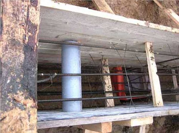 Installed plastic pipes for vents in the plinth