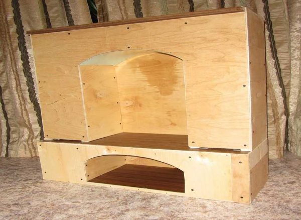 A portal to simulate a fireplace can be made from any sheet building material