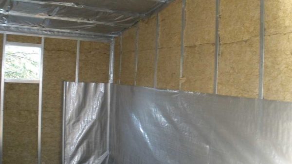 The vapor barrier membrane is rolled out
