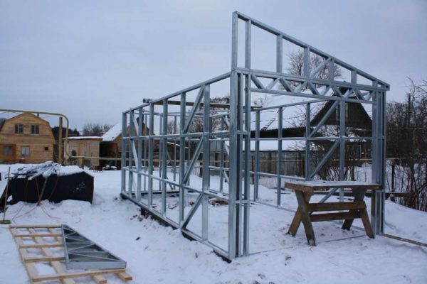 Garage frame assembled from galvanized profiles for installation of profiled sheet