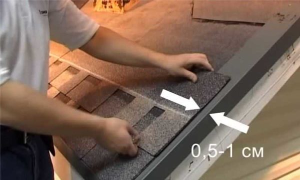 The tiles on the pediment are cut, stepping back 1 cm from the ledge of the pediment bar