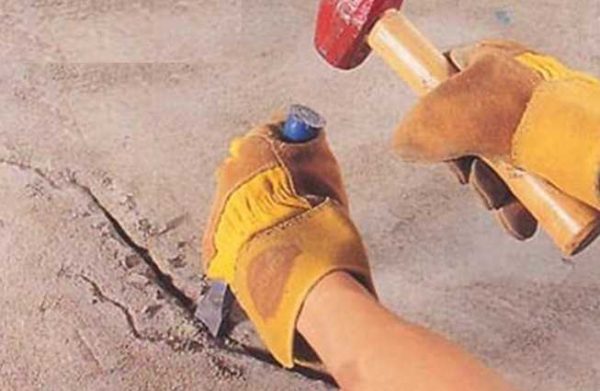 First we expand the cracks, then we fill them with mortar