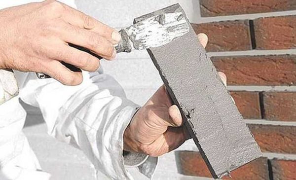 Glue is applied to the tiles